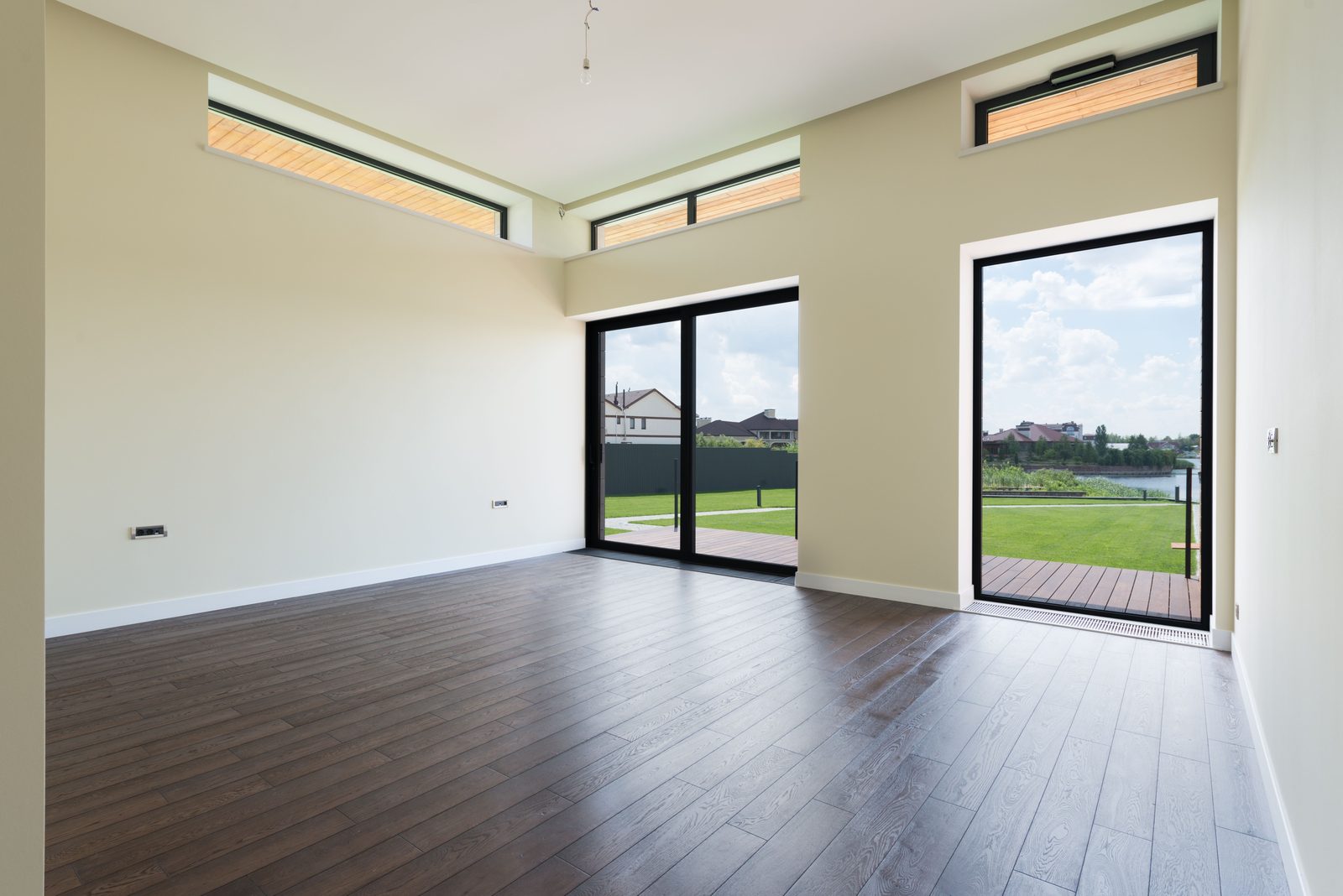 Laminate flooring in a room with sliding glass doors
